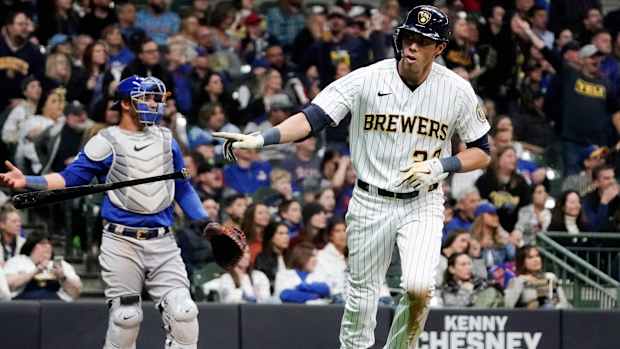Milwaukee Brewers’ Christian Yelich hits a two-run home run during the fifth inning of a baseball game against the Chicago Cubs Friday, April 29, 2022, in Milwaukee.